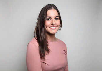 Obraz premium Beautiful young woman portrait, Studio shot isolated on grey background