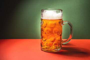 beer mug on green and red background, christmas