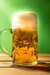 beer mug on green background