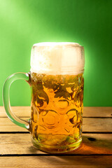 beer mug on green background