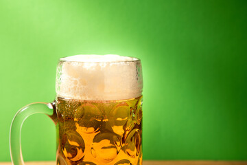 beer mug on green background