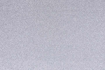 Elegant silver glitter texture, metallic shiny paper background.