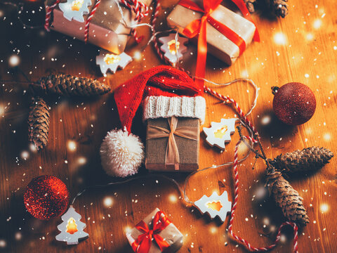 Christmas vintage composition with handmade gifts, cones, garland. Top view