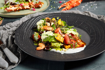 Delicious salads served on plates side view
