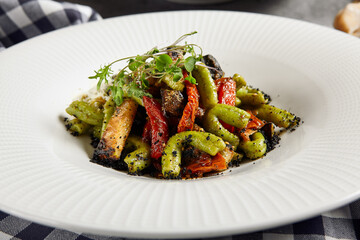 Gemelli pasta with baked vegetable
