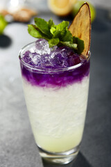 Modern cocktail with pear and ube  sweet potato