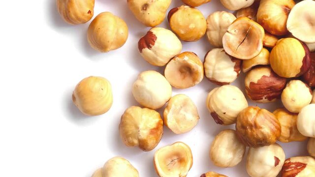 Hazelnuts roasted peeled isolated on white