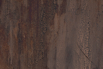 Grunge brown metal wall with peeling paint, close-up background photo texture