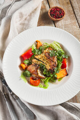 Chicken fillet with baked vegetable salad