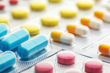 medical pills in plastic box. Pharmacy and medicine industry.