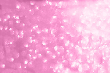 Abstract blurred pink sparkle bakground.