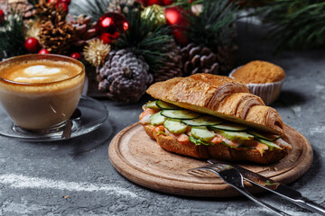 New Year's breakfast with croissants. New Year's croissant with shrimp. New Year and Christmas concept