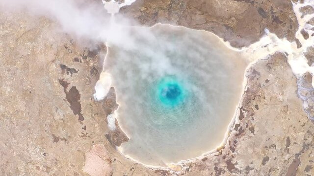 Great Geyser, geysir in the Golden Circle, Iceland, 4k aerial drone view