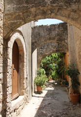 Fototapeta na wymiar Old Town of Rhodes, a narrow street, Rhodes, Greece