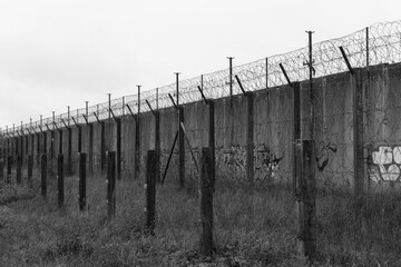 Barbed wire prison fence