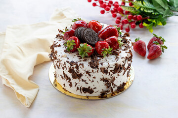 birthday cake with white chocolate and piece of chocolate