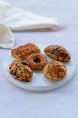 Salted pastries with cookies with sesames on serving plate