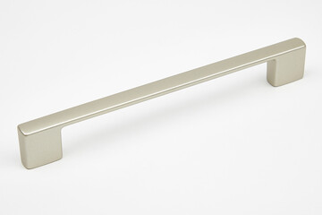 Matte metallic door handle on white background