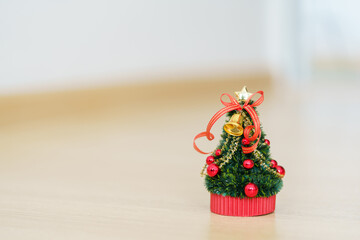 Miniature Christmas tree Celebrate Christmas on December 25 every year. using as background xmas concept with copy spaces for you