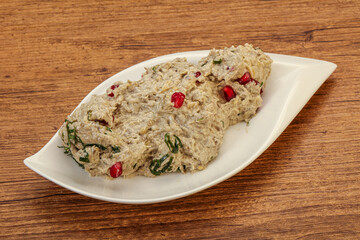 Vagan dietary cusine - mutabal with granet seeds