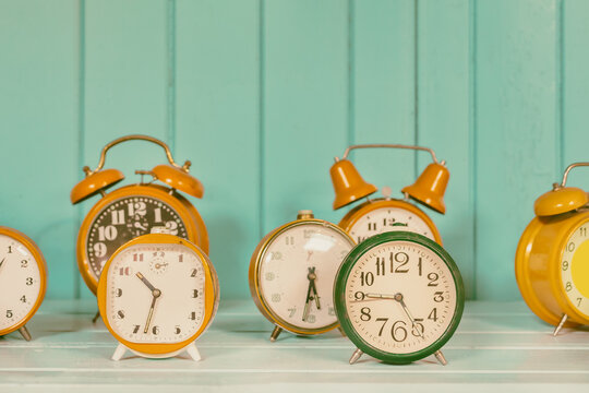 Set of different colorful alarm clocks