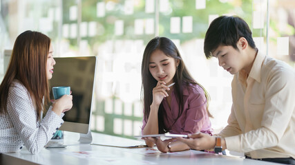 Young business team working with business report document on office desk. Brainstorming Business People Design Planning, Brainstorming Planning Partnership.