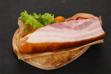 Smoked pork breast with salad leaves