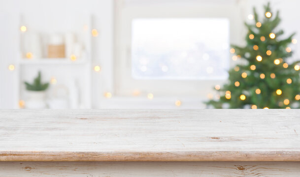 Table Space In Front Of Defocused Window Sill With Christmas Tree