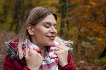 Autumnal portrait of attractive woman