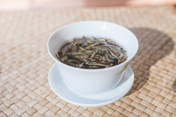 Bai Hao Yin Zhen (White Hair Silver Needle) white tea leaves steeping in a gaiwan/Zhong, Gong Fu Cha brewing. Beautiful full bud leaves perfectly processed.