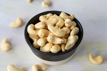 cashew on wooden background - kaju