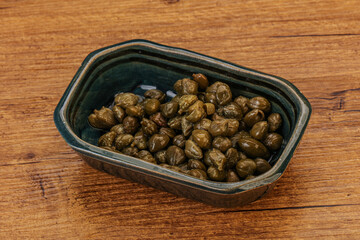 Tasty capers in the bowl