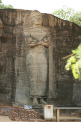 Polonnaruwa Sri Lanka Ancient ruins Statues of Buddha standing with crossed arms
