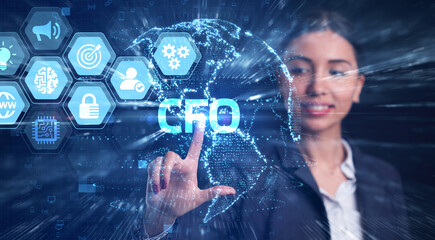 Business, Technology, Internet and network concept. Young businessman working on a virtual screen of the future and sees the inscription: CFO