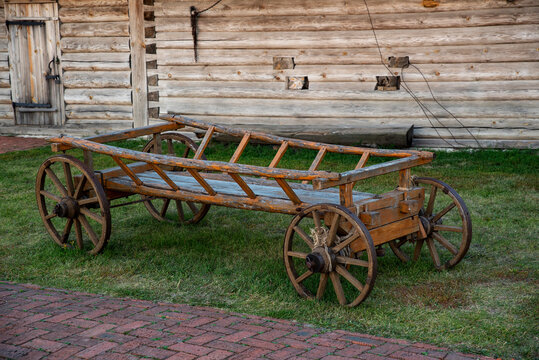 old wooden cart standing near the barn