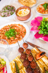 Turkish sausage also known as Sucuk. Grilled or barbecued Turkish sausage on the table in the Turkish restaurant.