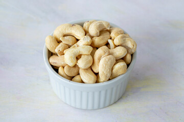 cashew on wooden background - kaju