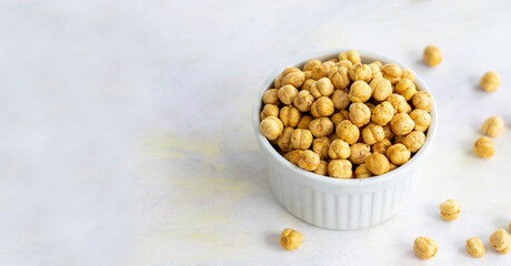 Hazelnuts in plate isolated on white background - copy space
