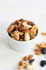 mixed nuts in bowl - on white background