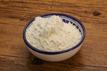 Wheat flour heap in the bowl