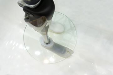 Bionic leg on a plastic mannequin. Modern prosthetic limbs. Cropped frame. View from above.