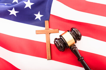 American flag with Christian cross and gavel of justice.