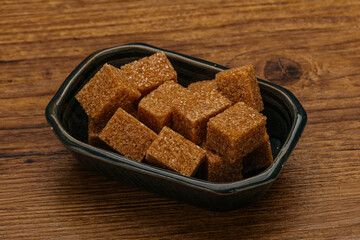 Cane sugar cubs in the bowl