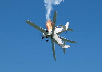 Collision between two small planes. The planes collided during an aviation demonstration.