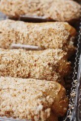 
Delicious eclairs with vanilla cream close up