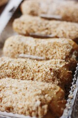 
Delicious eclairs with vanilla cream close up