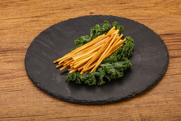 Chechel cheese sticks over board