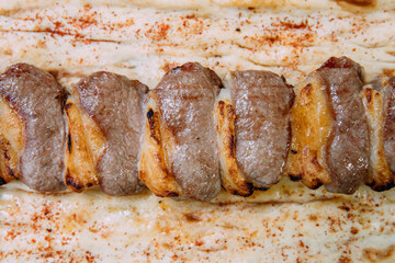 Skewers of grilled shish kebab or barbecued shashlik meat. 