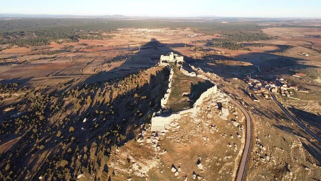 Aerial view of a medieval Fortress at sunset. San Esteban de Gormaz, Soria, Spain, Europe. High quality 4k footage