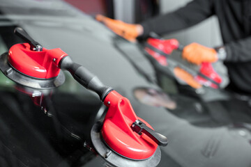 Auto Glass Repair and Replacement, close up. High quality photo